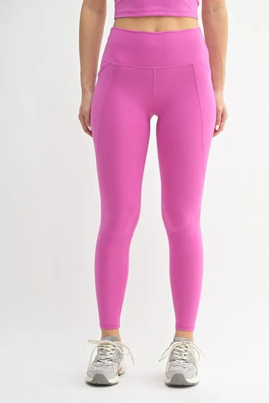 Woman wearing the Her Femme Fit Cloud Sculpt High-Rise Leggings in Orchid