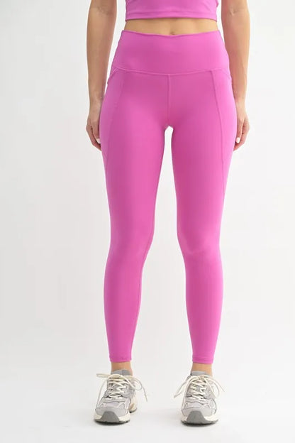 Woman wearing the Her Femme Fit Cloud Sculpt High-Rise Leggings in Orchid