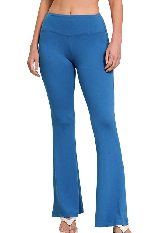 Woman wearing the Her Femme Fit Buttery Soft Flare Yoga Pants in Classic Blue