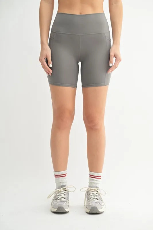 Woman wearing the Her Femme Fit Cloud Sculpt Biker Shorts in Pewter