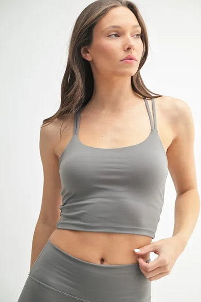 Woman wearing the Her Femme Fit Cloud Sculpt Crisscross Sports Bra in Pewter