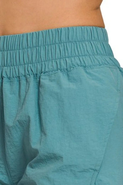 Her Femme Fit Windbreaker Running Shorts in Dusty Teal, detail view 2